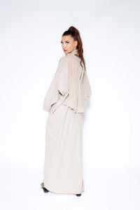 Beige linen abaya featuring an open-front style with front slit pockets