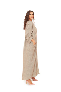 side look of the brown linen Abaya