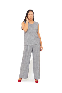 a look of lose sleeveless top with wide leg linen trouser 